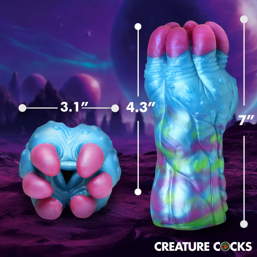 Creature Cocks Asstra silicone stroker in a blue, pink, and green swirl color scheme, shown with dimensions.