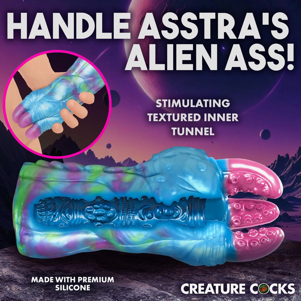 Creature Cocks Asstra silicone stroker in a blue, green, and purple tie-dye alien design with a textured inner tunnel.