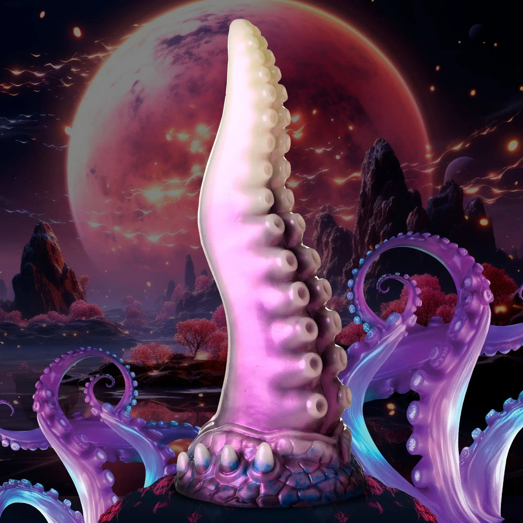 Creature Cocks Astropus silicone dildo: a purple and cream tentacle-shaped toy with realistic suction cups.