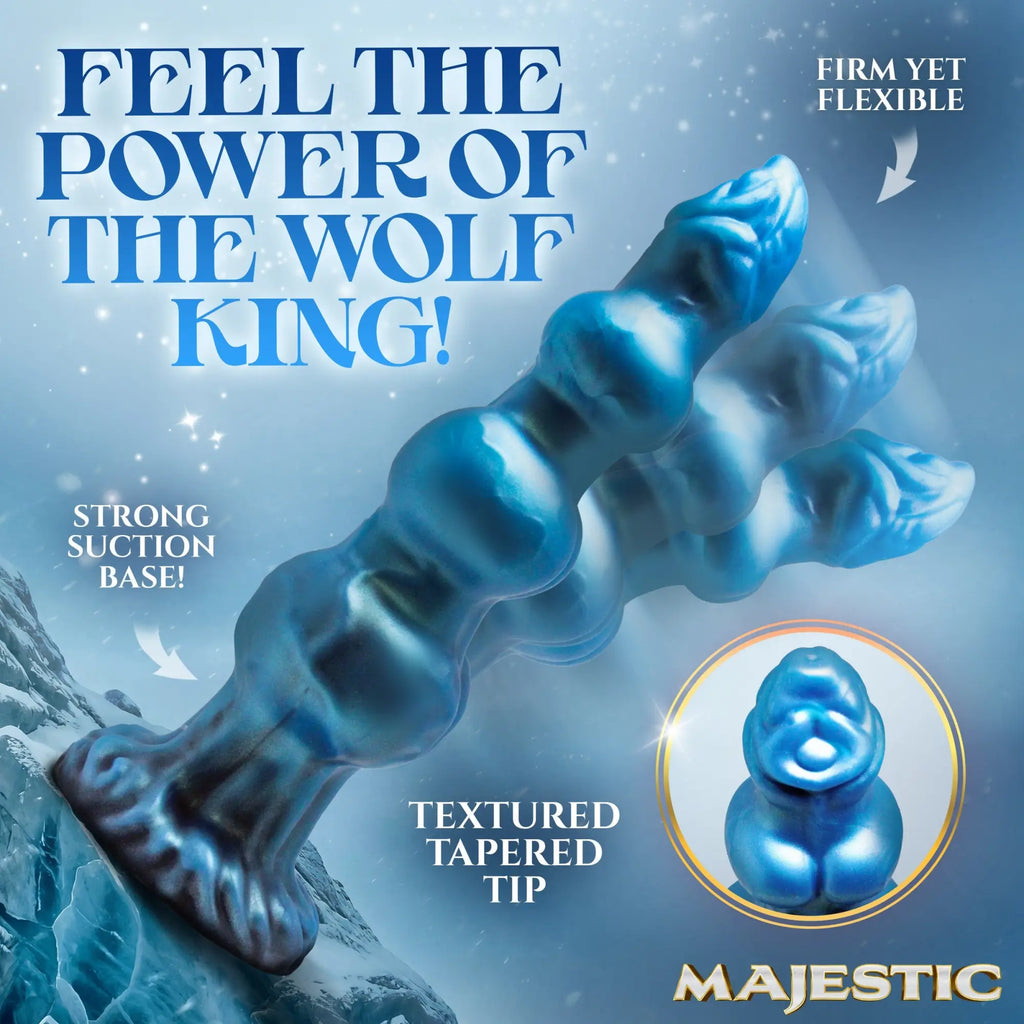 Creature Cocks Auren Wolf King blue silicone dildo with a textured, tapered tip and suction cup base on a snowy backdrop.