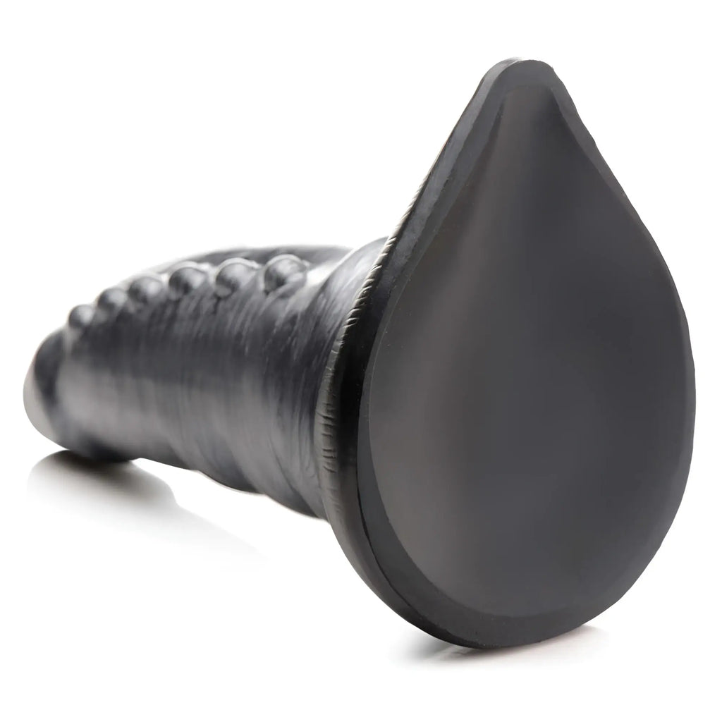 Creature Cocks Beastly dildo: black, tapered, textured silicone toy with a teardrop-shaped flat base.