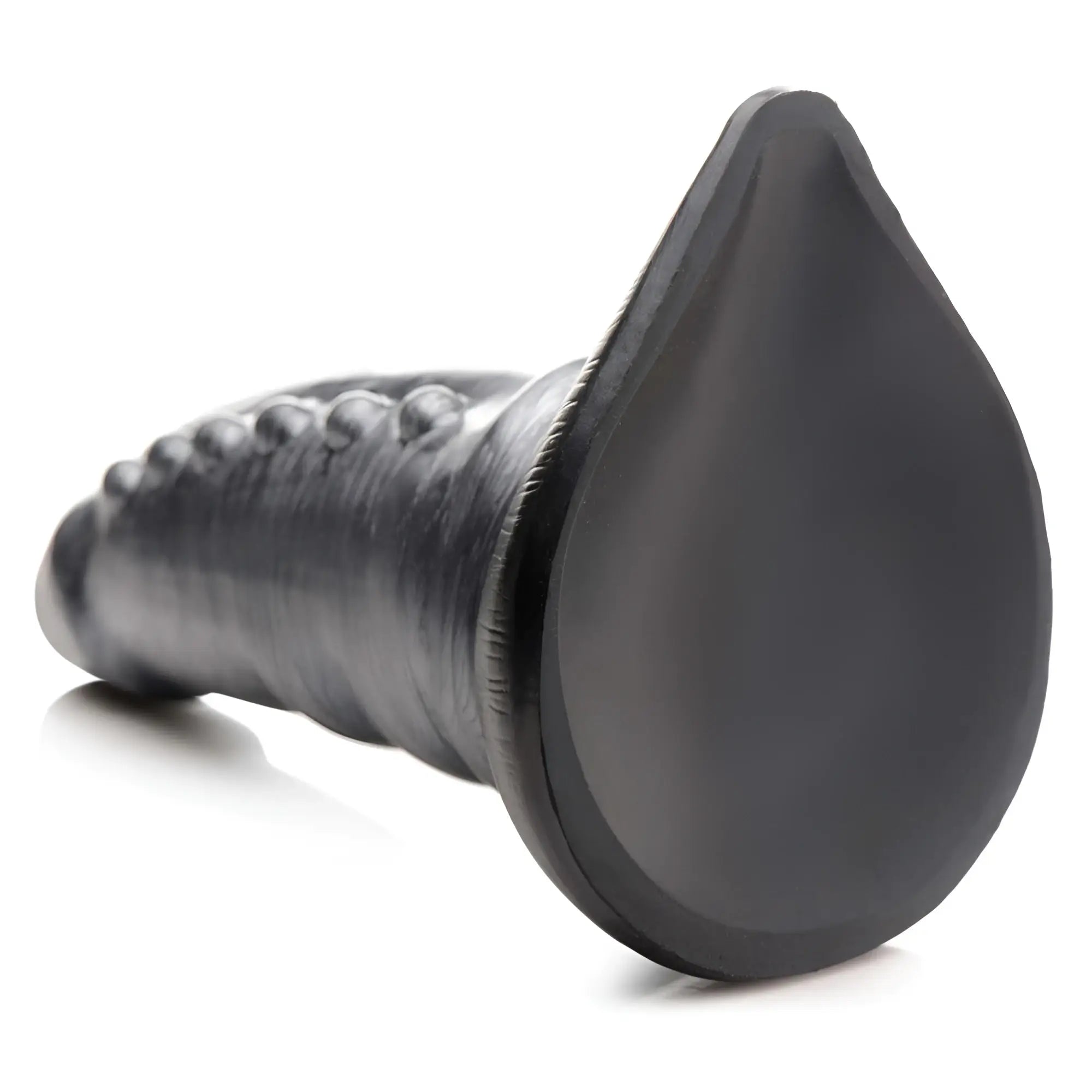 Creature Cocks Beastly dildo: black, tapered, textured silicone toy with a teardrop-shaped flat base.