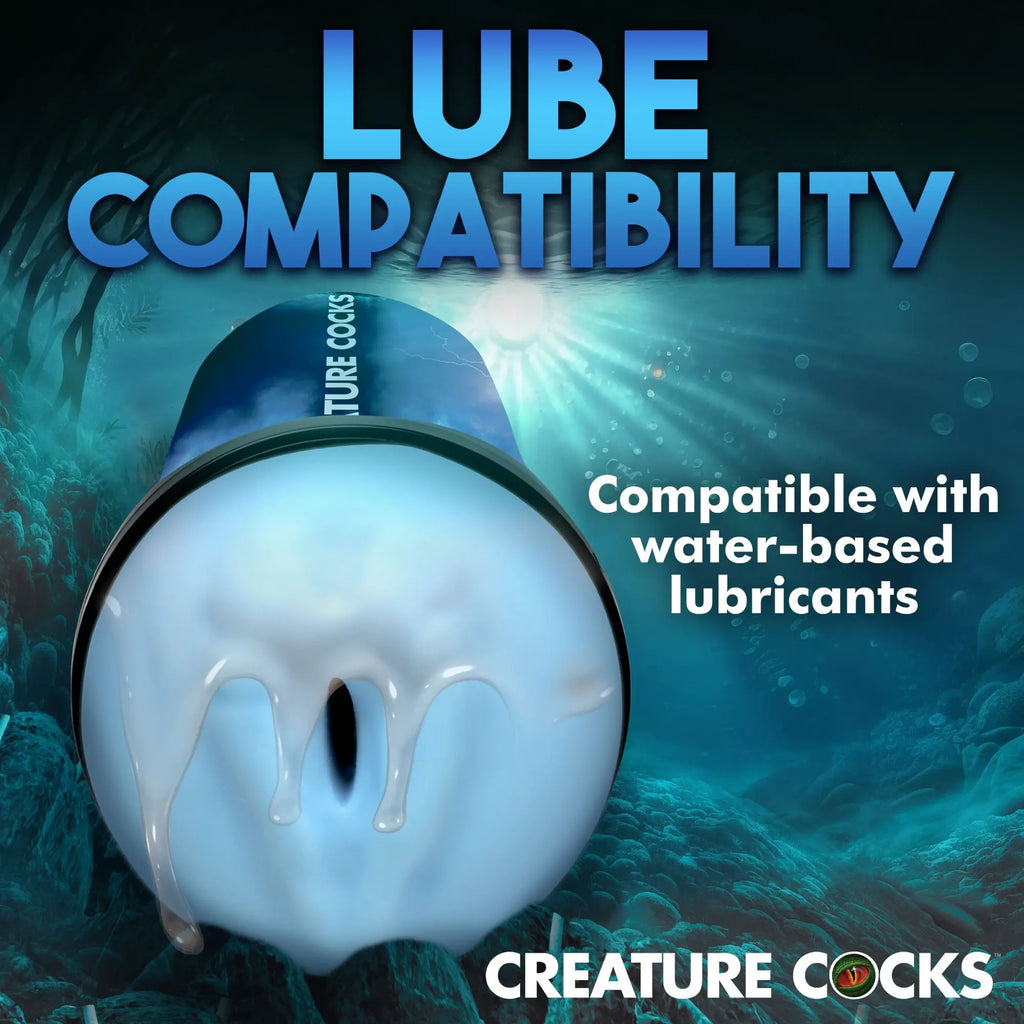Creature Cocks Bussidon Sea Monster stroker with a blue textured sleeve, shown against an underwater background.