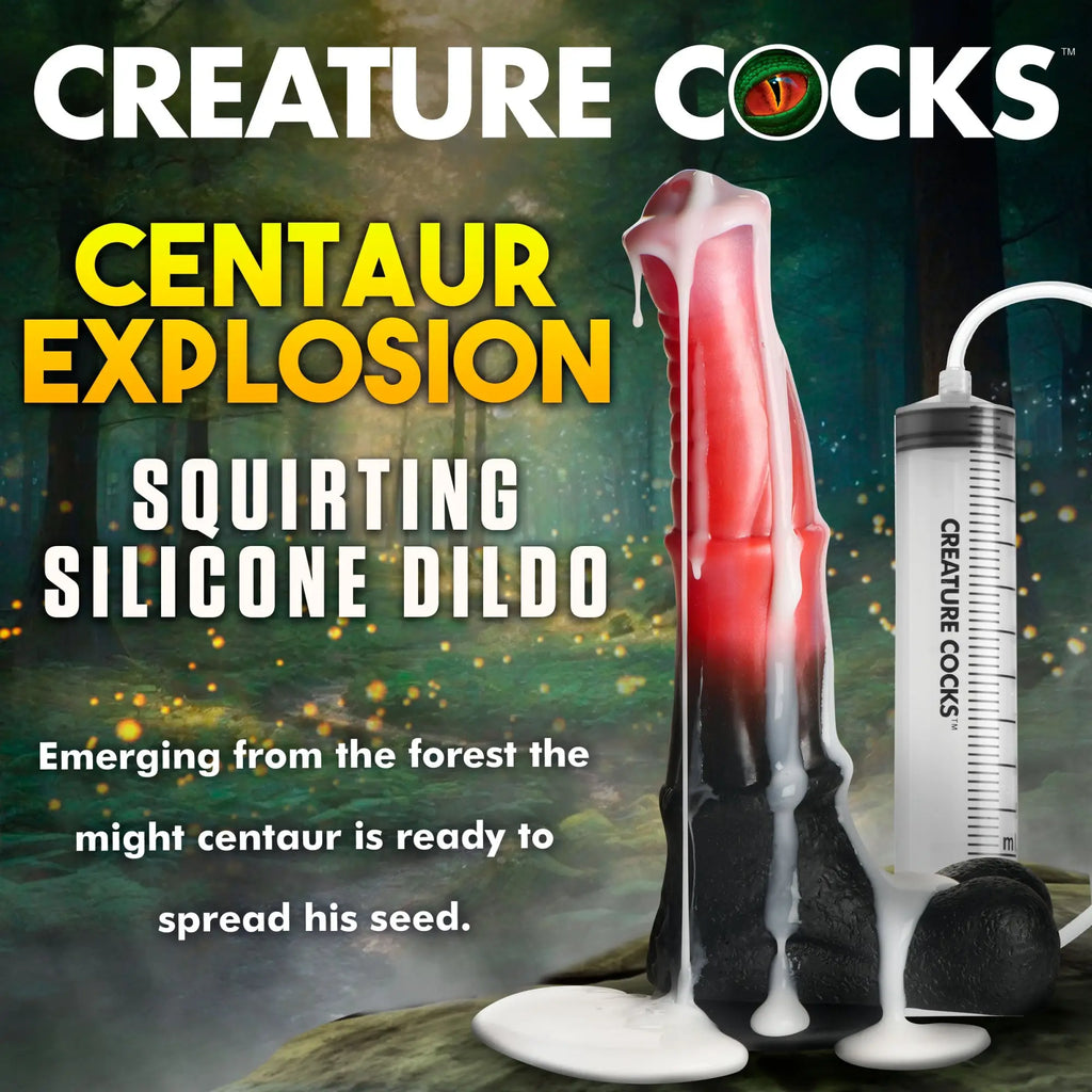Red and black creature-style silicone dildo with squirting mechanism, against a forest background.