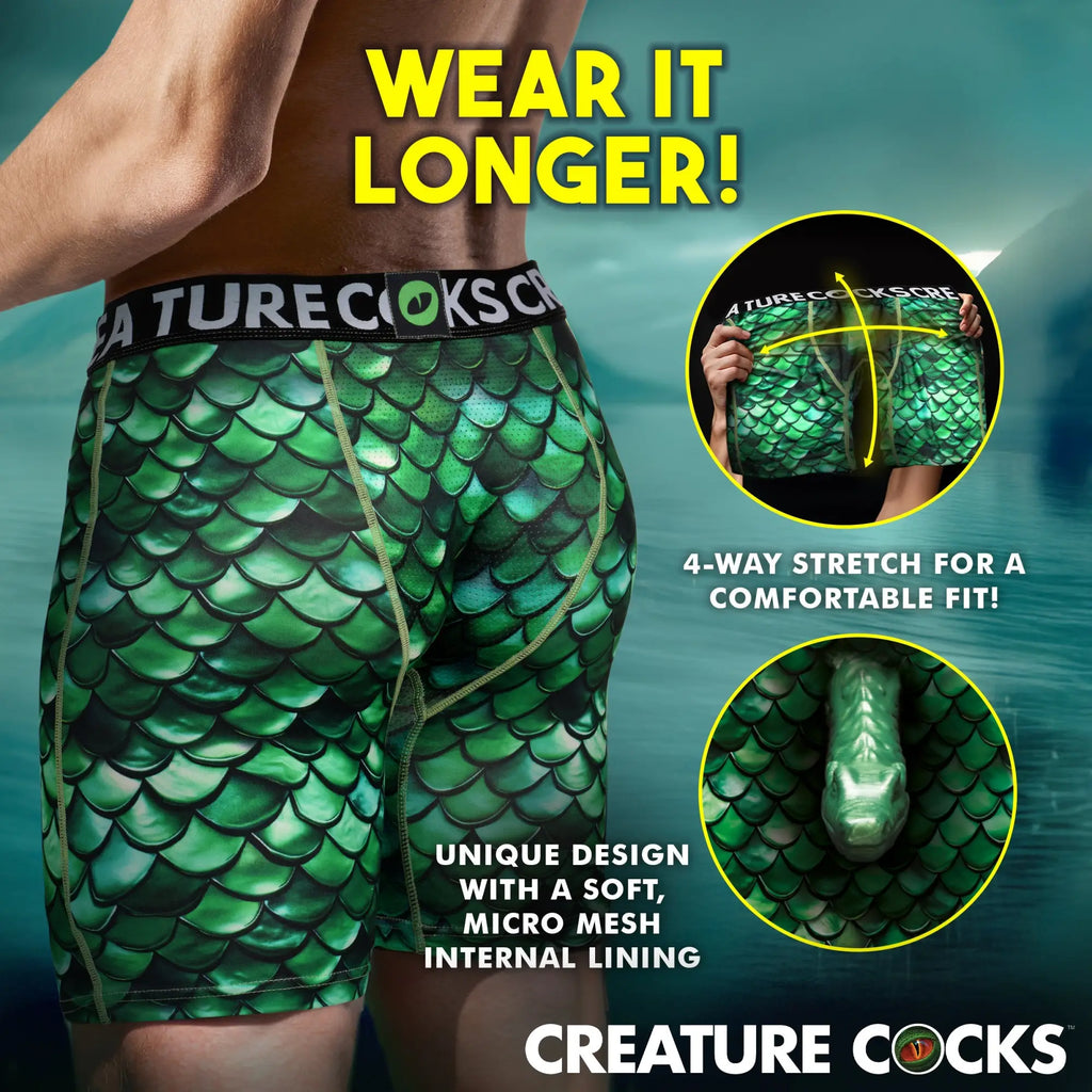 Creature Cocks Cockness Monster boxer shorts in green dragon-scale print with a unique internal mesh pocket design.