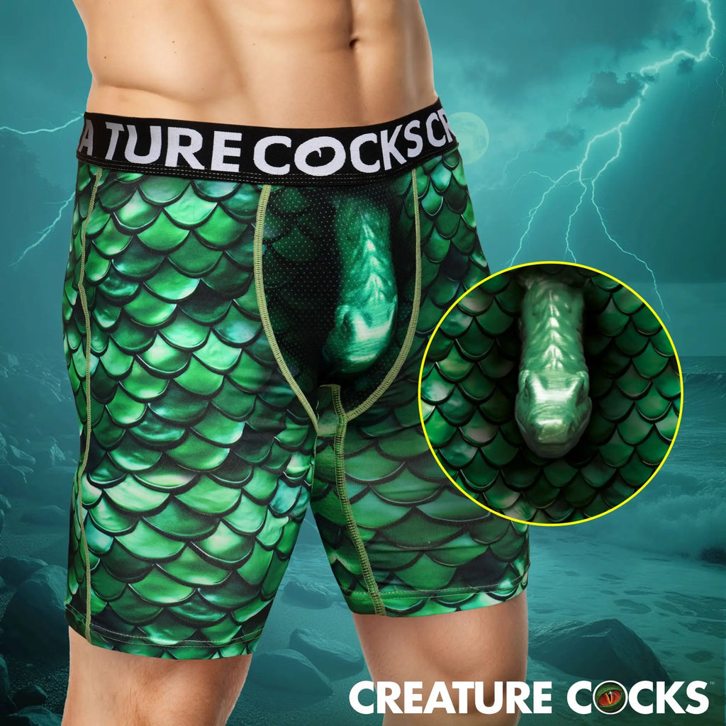 Creature Cocks Cockness Monster boxer briefs in green dragon scale print with a molded, reptile-shaped front pouch.