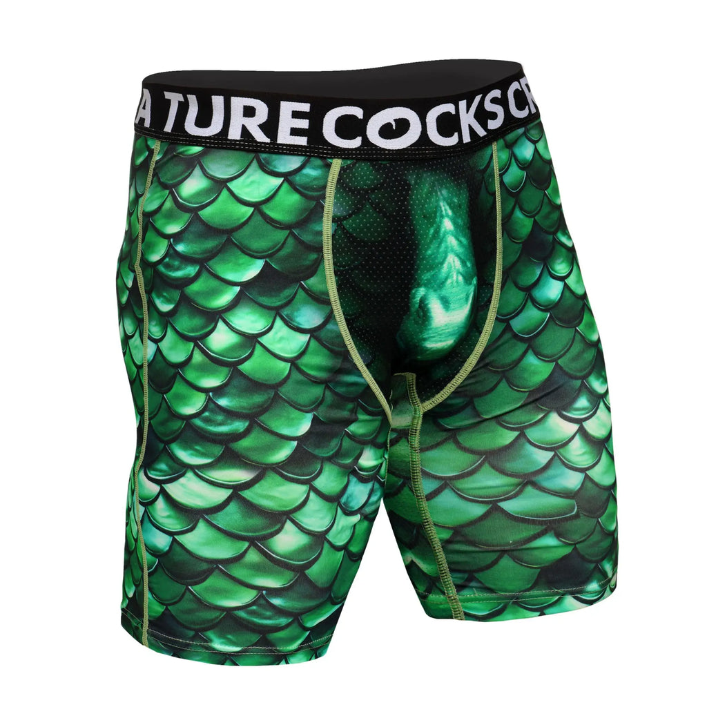 Creature Cocks Cockness Monster boxer briefs featuring a green dragon scale print and black branded waistband.