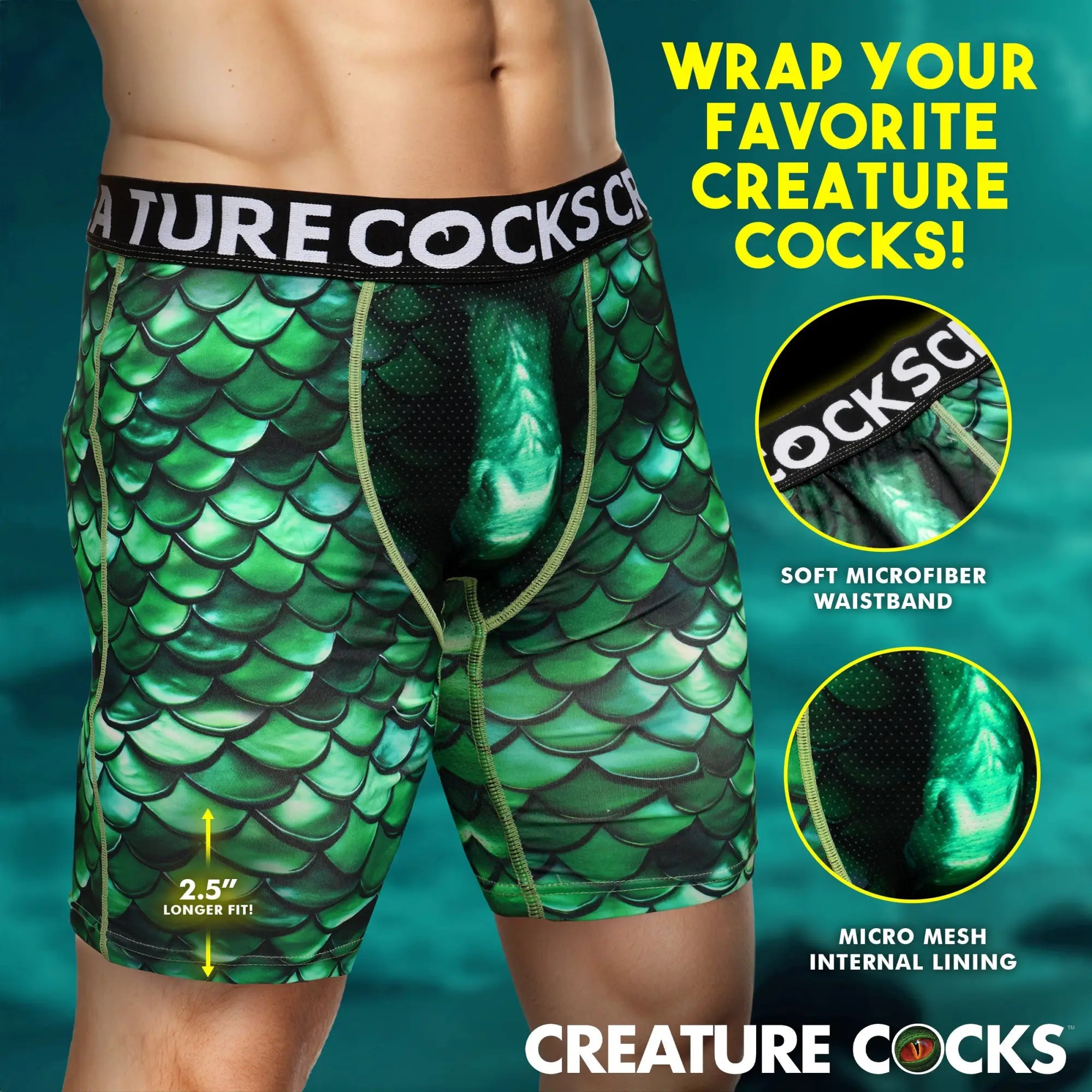 Creature Cocks Cockness Monster boxer shorts in green dragon-scale print, featuring a black waistband and mesh details.
