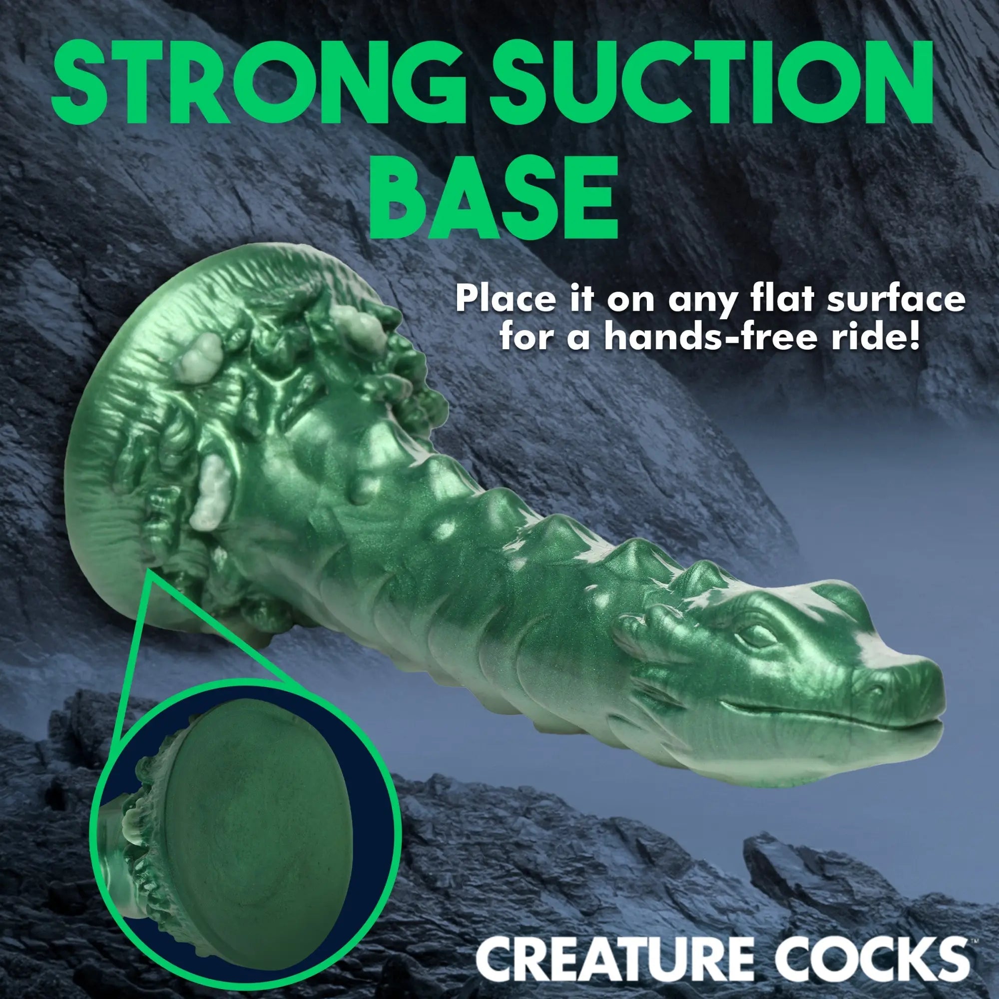 Metallic green Creature Cocks Cockness Monster dildo with textured scales, dragon head tip, and suction cup base.