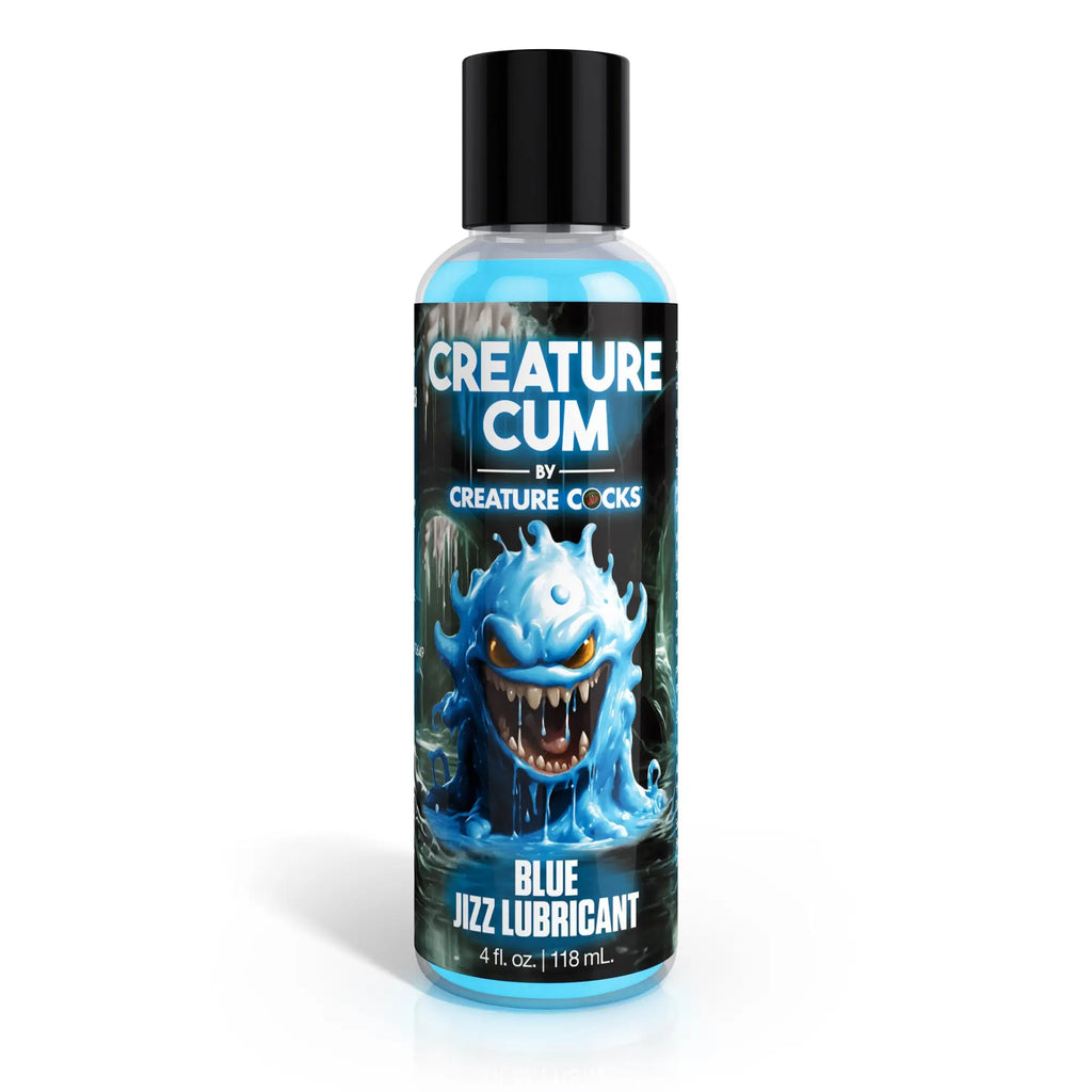A 4 oz. clear bottle of blue-tinted lubricant with a black cap, featuring a cartoon monster label.