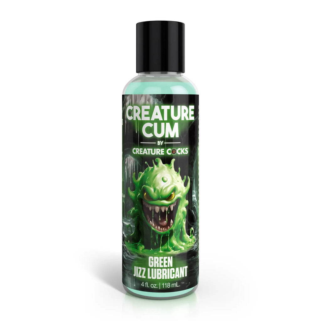 Creature Cocks Green Jizz lubricant bottle featuring a monster graphic on a black label with a black cap.