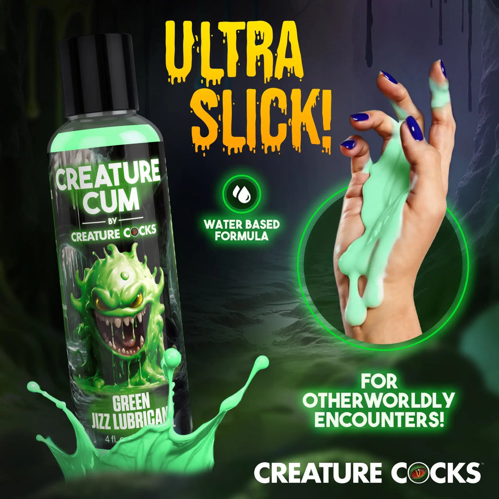 Creature Cocks Green Jizz Lubricant bottle next to a hand covered in thick, neon-green slimy liquid.