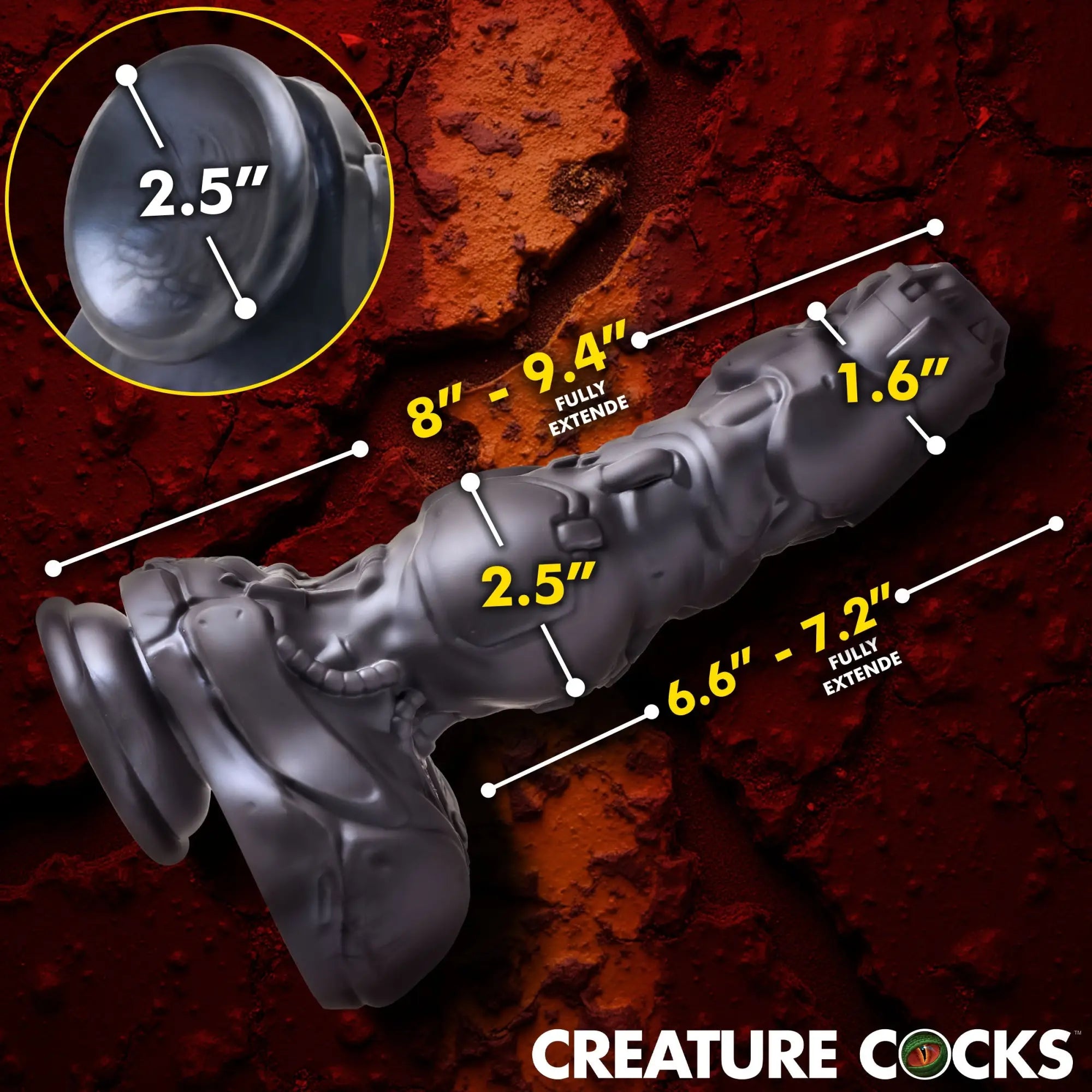 Creature Cocks Cyborg dildo: matte black, mechanical-style silicone toy with dimension labels on a dark, textured ground.