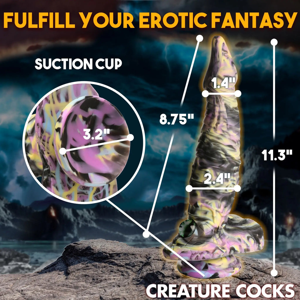 Creature Cocks Cyclops monster dildo: a swirl-patterned purple, yellow, and black silicone toy with a suction base.