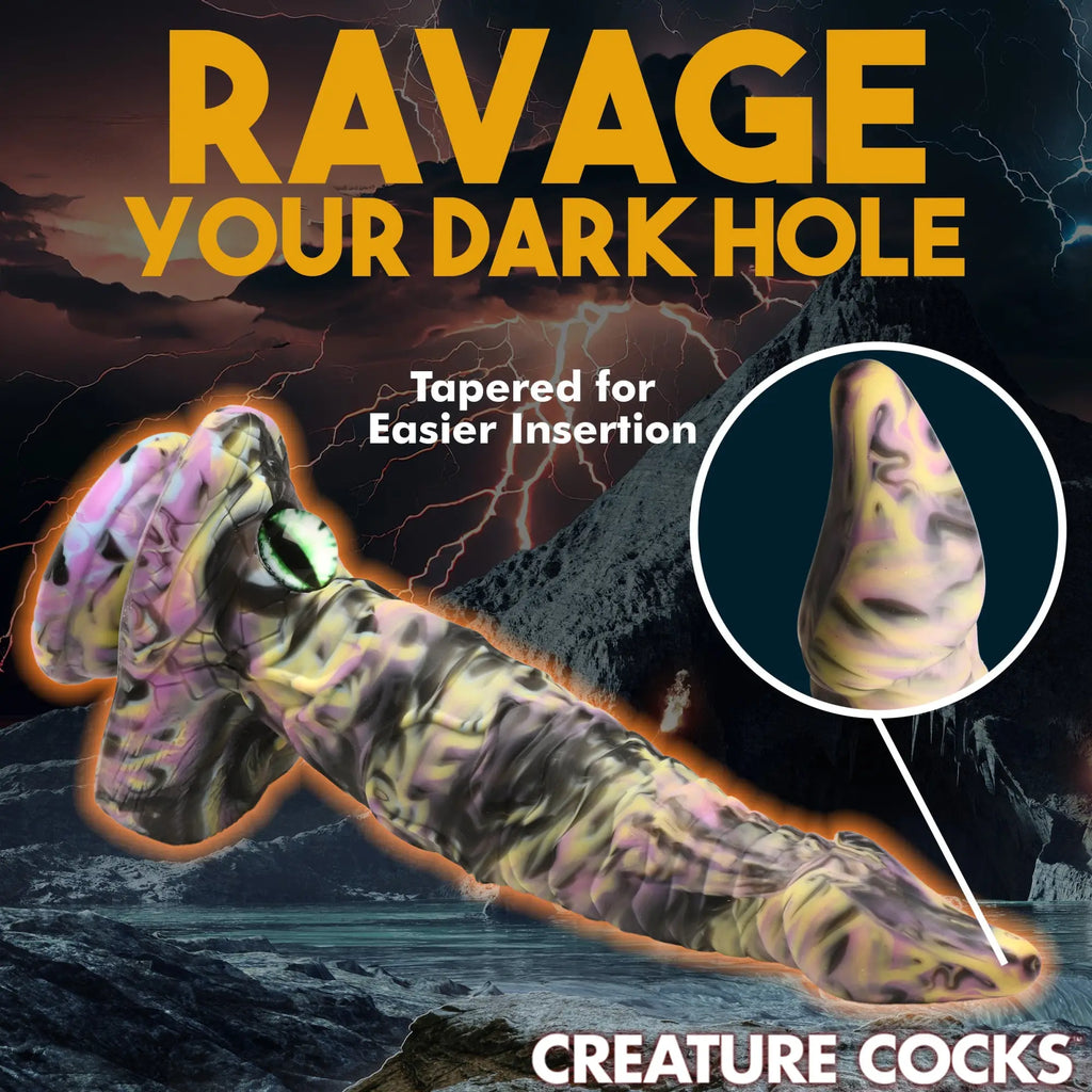 Creature Cocks Cyclops monster silicone dildo with a purple, yellow, and black marble pattern and green cyclops eye.