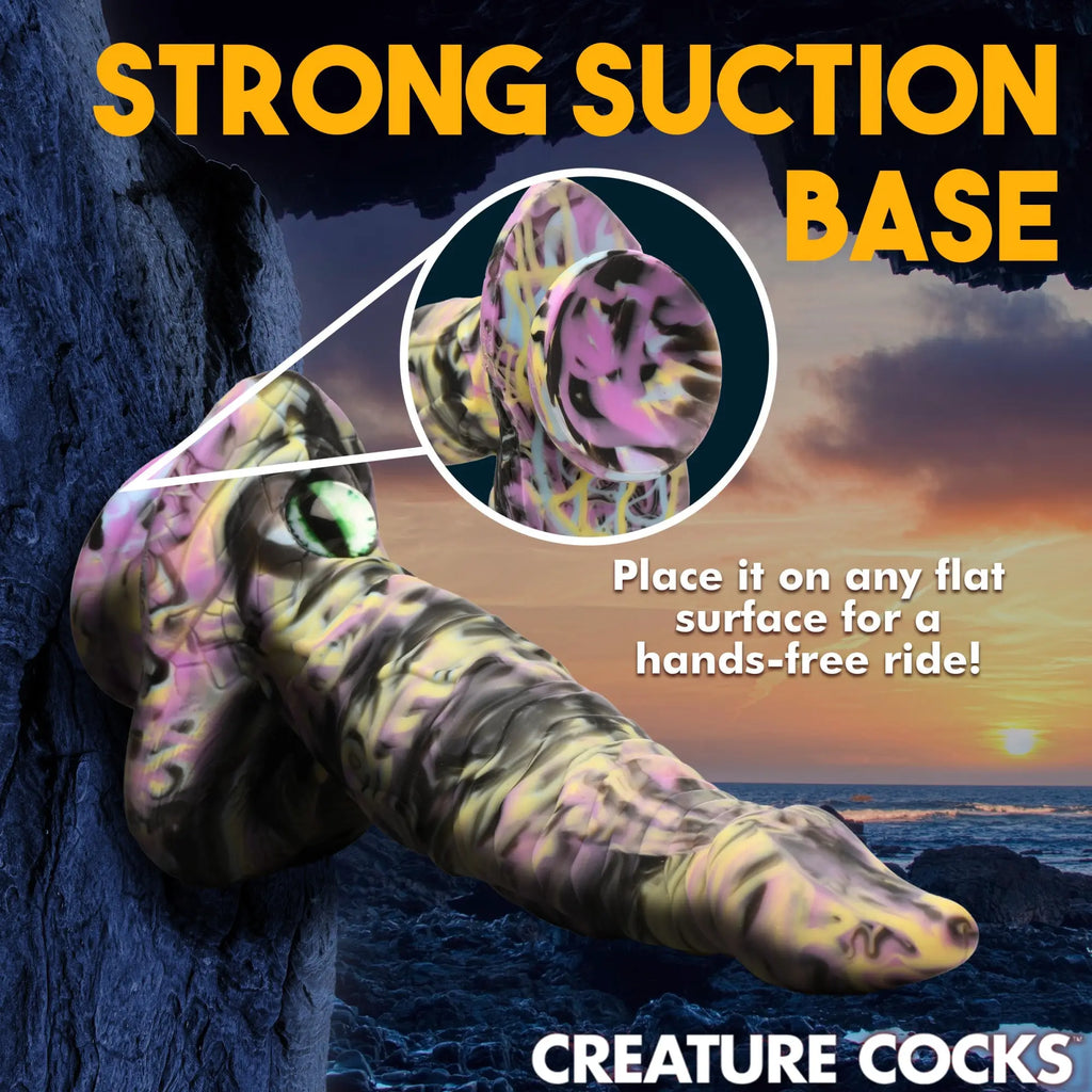 Creature Cocks Cyclops monster dildo with a black, pink, and yellow marble design and a strong suction cup base.