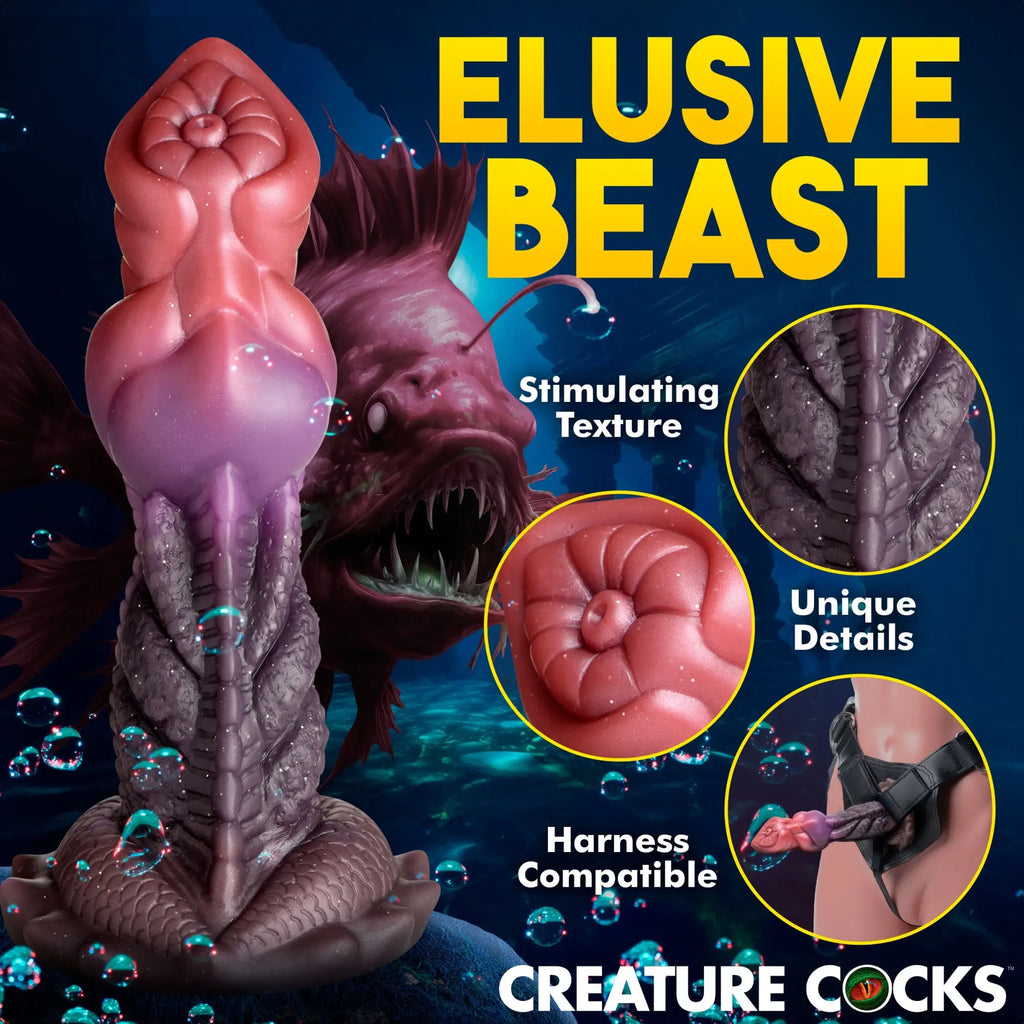 Creature Cocks Deep Diver dildo features a pink-to-purple gradient, textured sea-creature design, and harness compatibility.