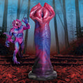 Creature Cocks Demogorgon silicone dildo in a pink and blue swirl pattern, featuring a petaled, mouth-like head.