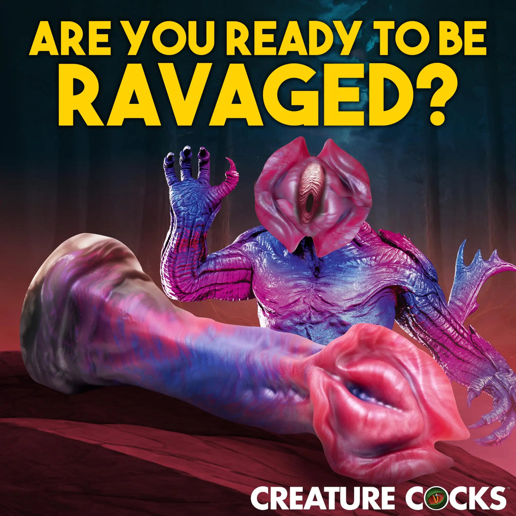 Creature Cocks Demogorgon silicone dildo: a pink and blue monster-themed toy with a petaled, orifice-like head.