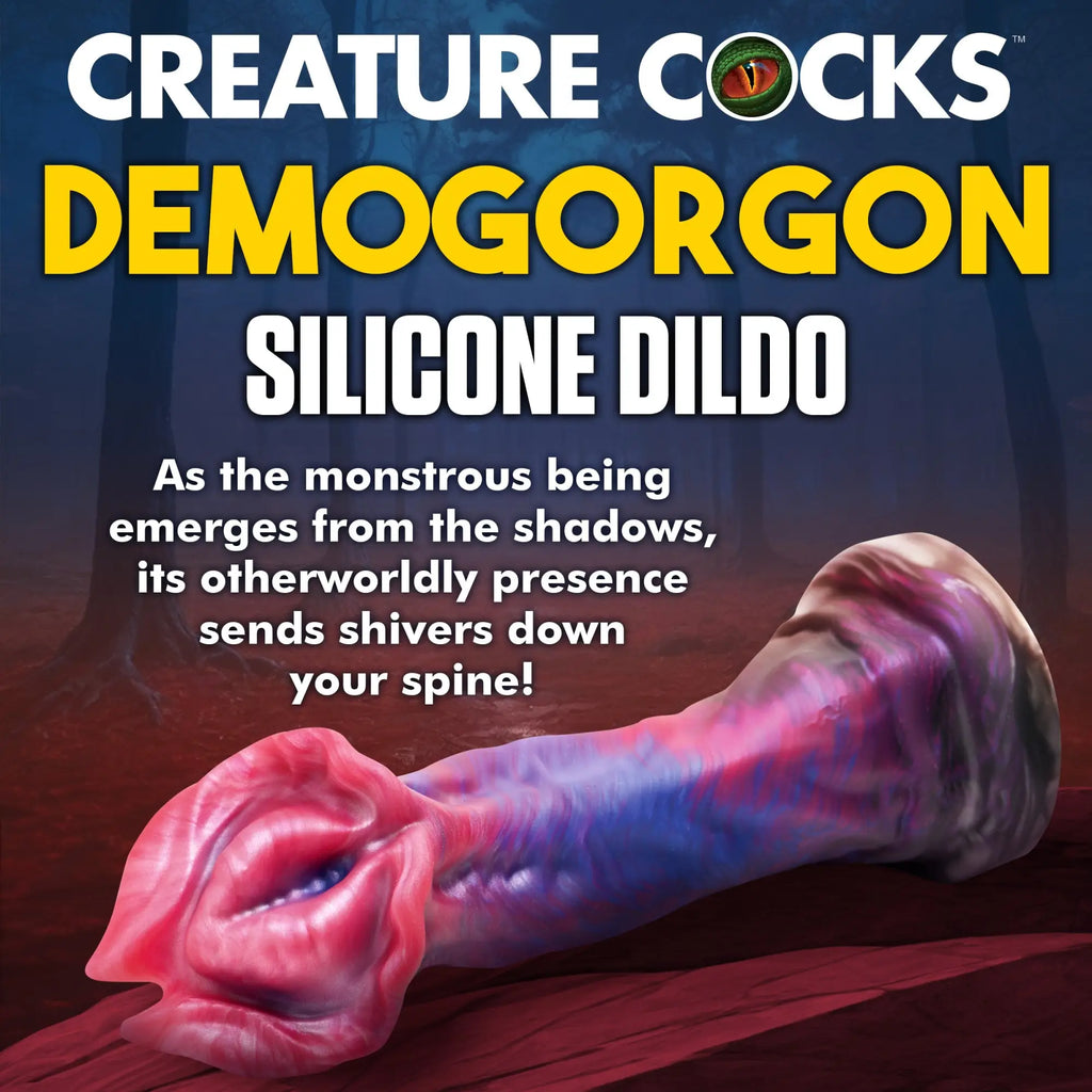 Creature Cocks Demogorgon silicone dildo with a pink, purple, and blue textured, monster-inspired design.