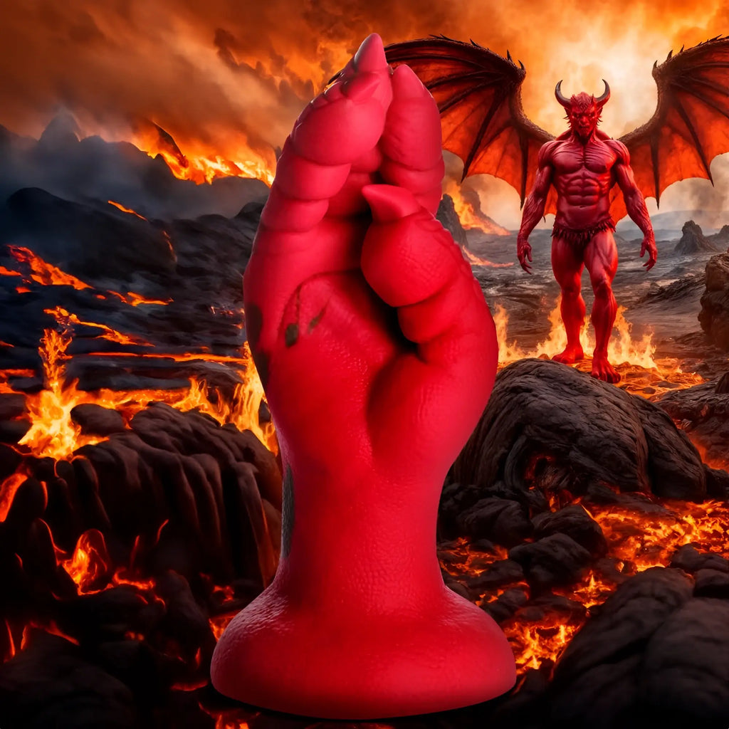 Red Creature Cocks Demon Claw fisting dildo in front of a hellish, volcanic landscape with a winged demon background.