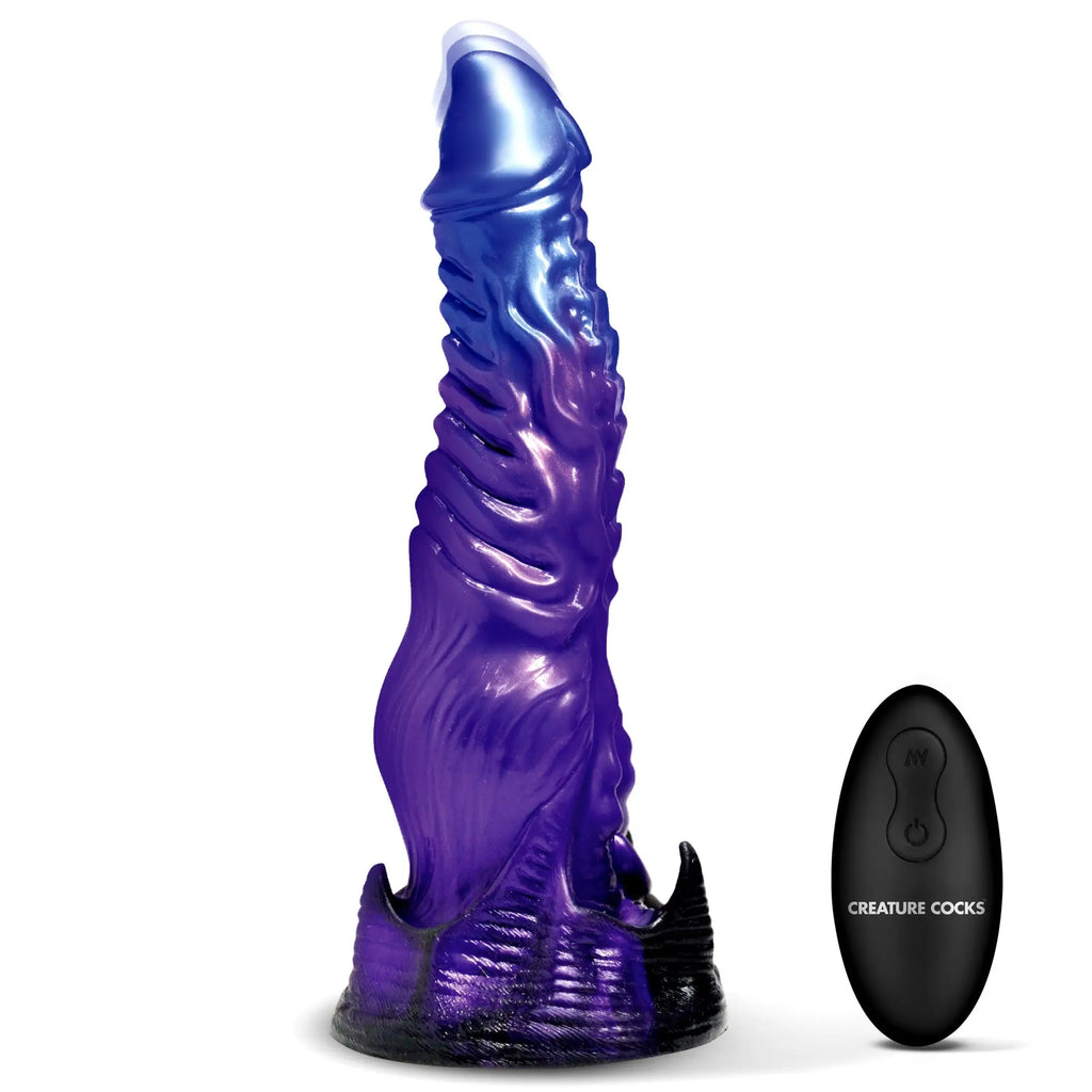 Creature Cocks Diabolos vibrating dildo in metallic purple and blue, with textured fantasy design and black remote.