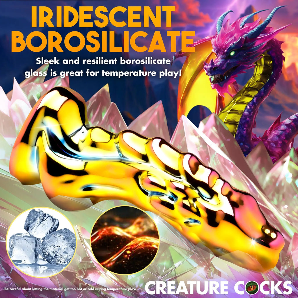 Creature Cocks Dragon Glass dildo: a sleek, iridescent gold borosilicate glass toy against a fantasy dragon backdrop.