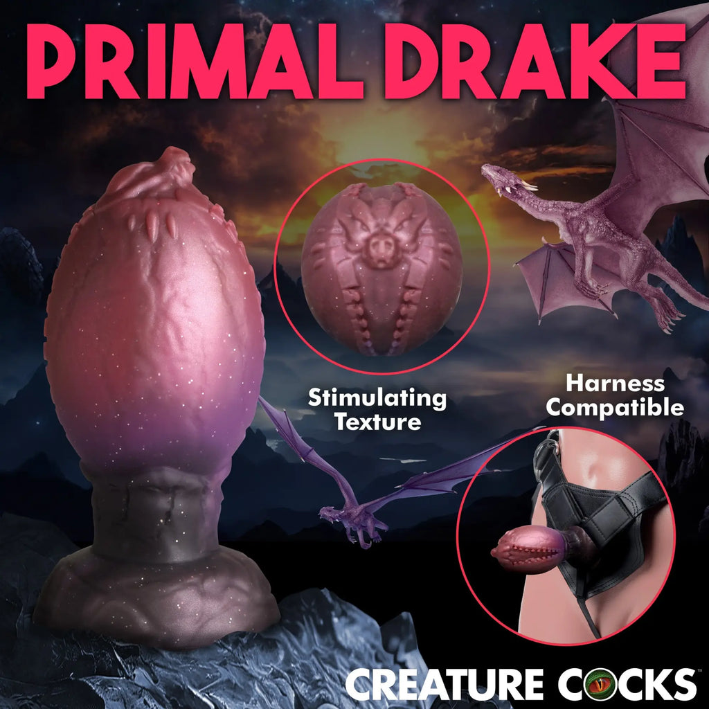 Creature Cocks Dragon Hatch: a purple silicone egg with textured details, shown standalone and in a body harness.
