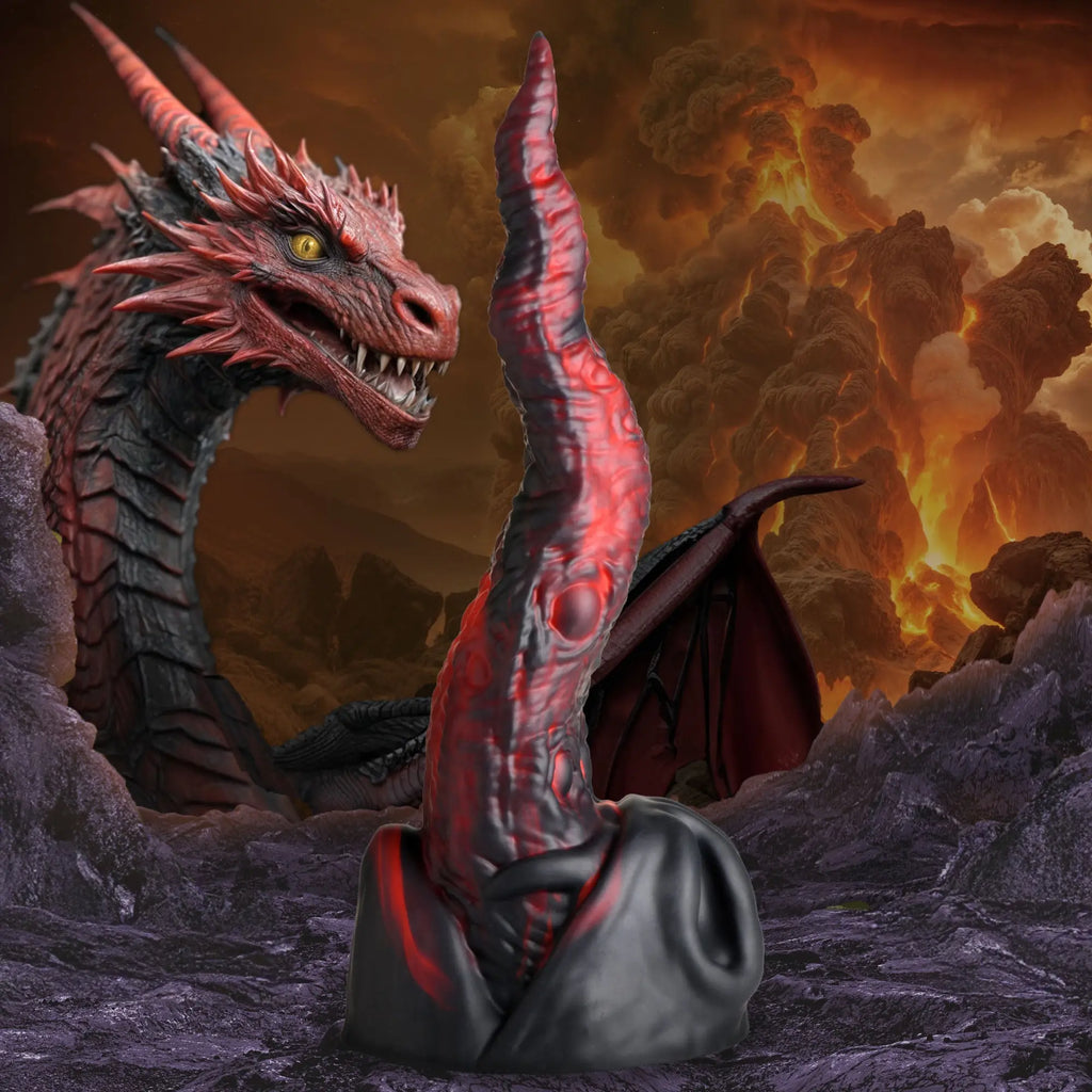 Creature Cocks Dragon Tongue silicone dildo in black and red, shown against a fiery dragon and volcanic landscape.
