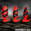 Creature Cocks Dragon Trainer set: three red and black swirled silicone butt plugs with textured, ridged shafts.