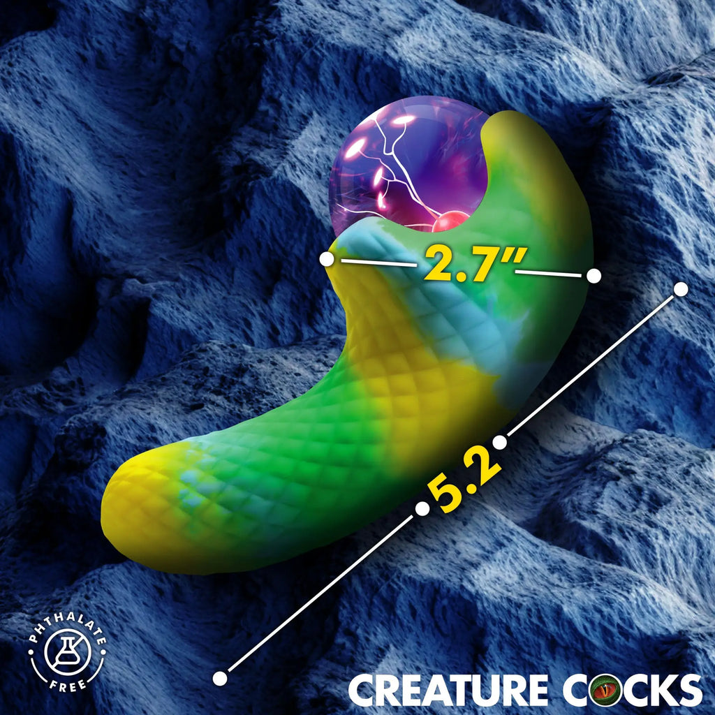 Creature Cocks Electric Eye plasma vibrator, a green and yellow textured silicone toy with a glowing purple plasma bulb.