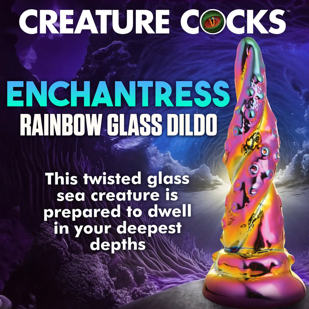 Creature Cocks Enchantress: A twisted, iridescent rainbow glass dildo with a tentacle-like texture, set underwater.