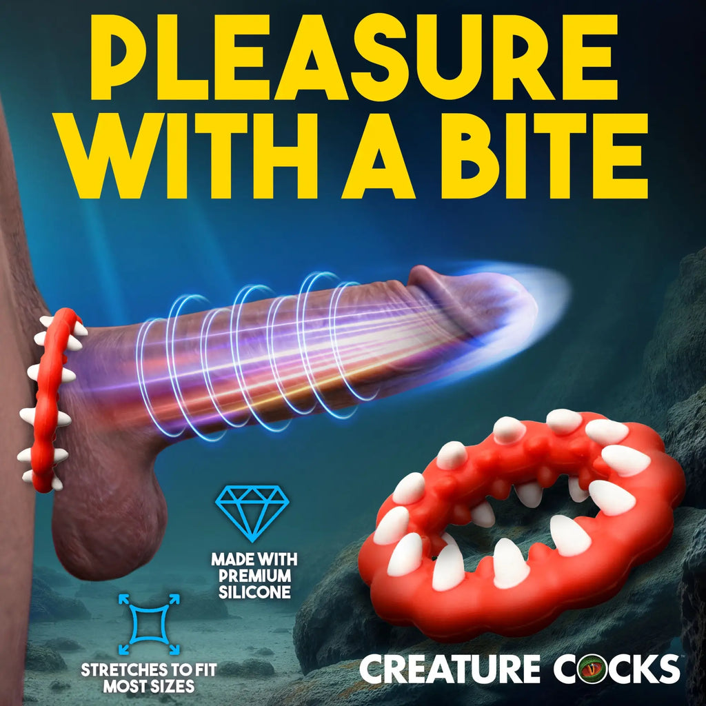 Creature Cocks Fangs red silicone cock ring with white teeth details, shown in use and on its own against a dark backdrop.