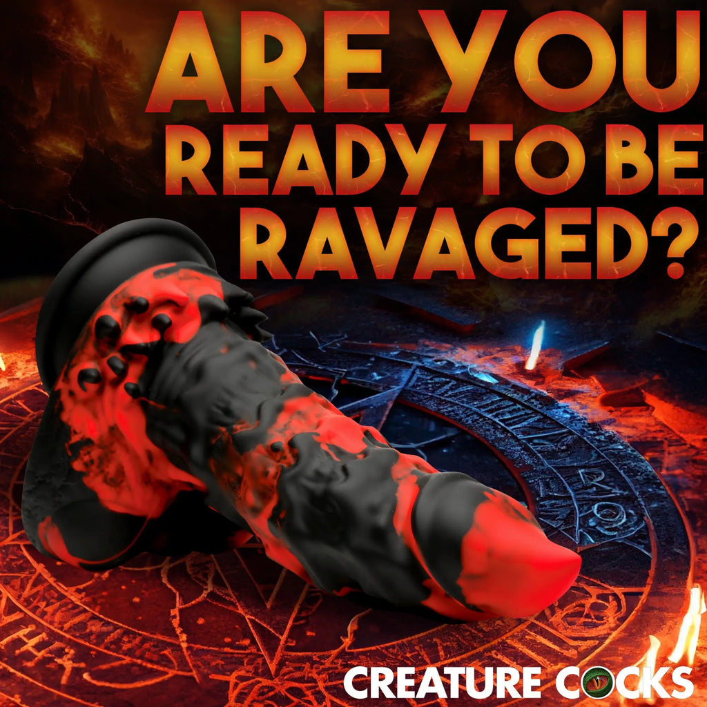 Creature Cocks Fire Demon dildo: a textured black and red monster-style silicone toy on a glowing ritualistic surface.