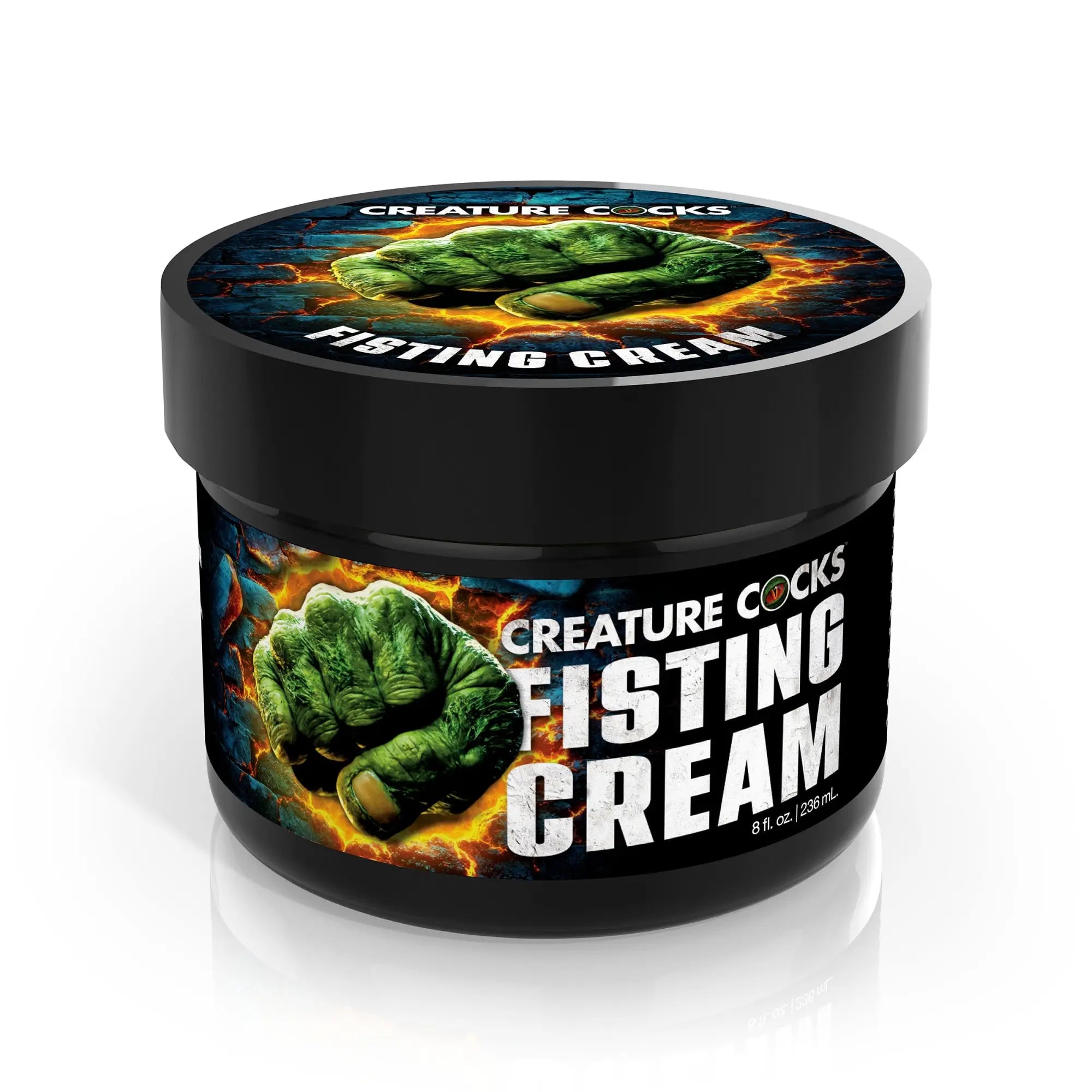 Creature Cocks Fisting Cream in a black jar featuring a green fist graphic on a fiery, cracked background.