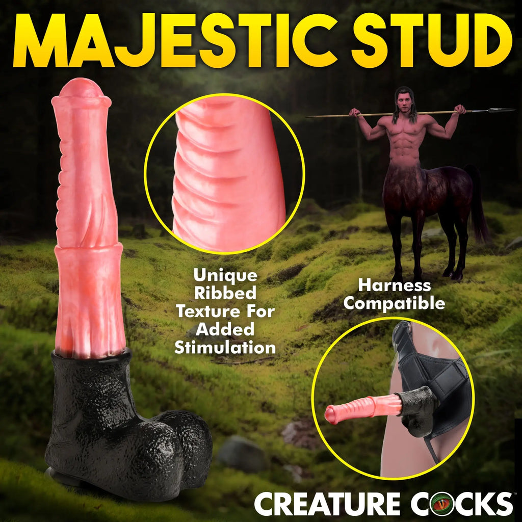 Creature Cocks Giant Centaur XL silicone dildo in pink with a black hoof-style base, showing texture and harness use.