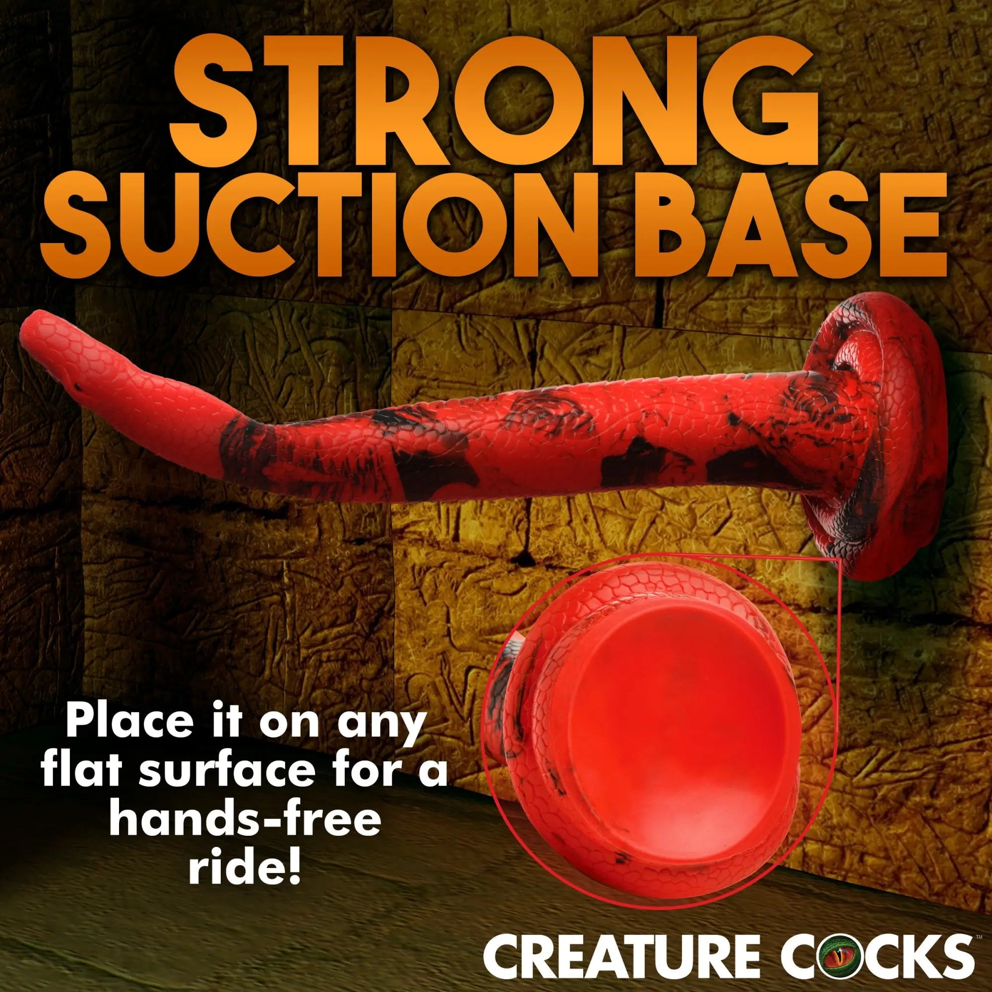 Creature Cocks Giant King Cobra silicone dildo in red and black, shown attached to a wall with a suction base.