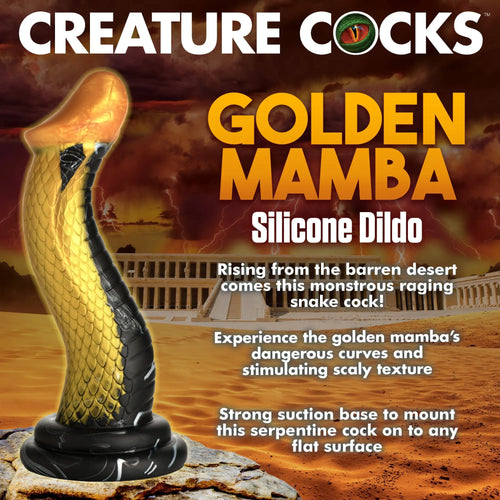 Creature Cocks Golden Mamba silicone dildo: a black-and-gold snake-textured toy with a suction base against a desert.