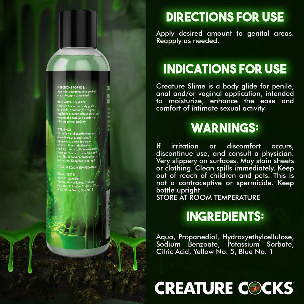 Creature Cocks Green Creature Slime lubricant bottle with informative label and product text against a green slime background.