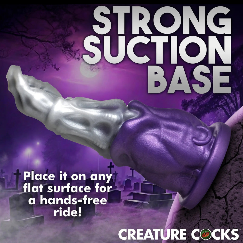 Creature Cocks Grim Reaper silicone dildo with a silver-to-purple gradient, textured design, and a strong suction base.