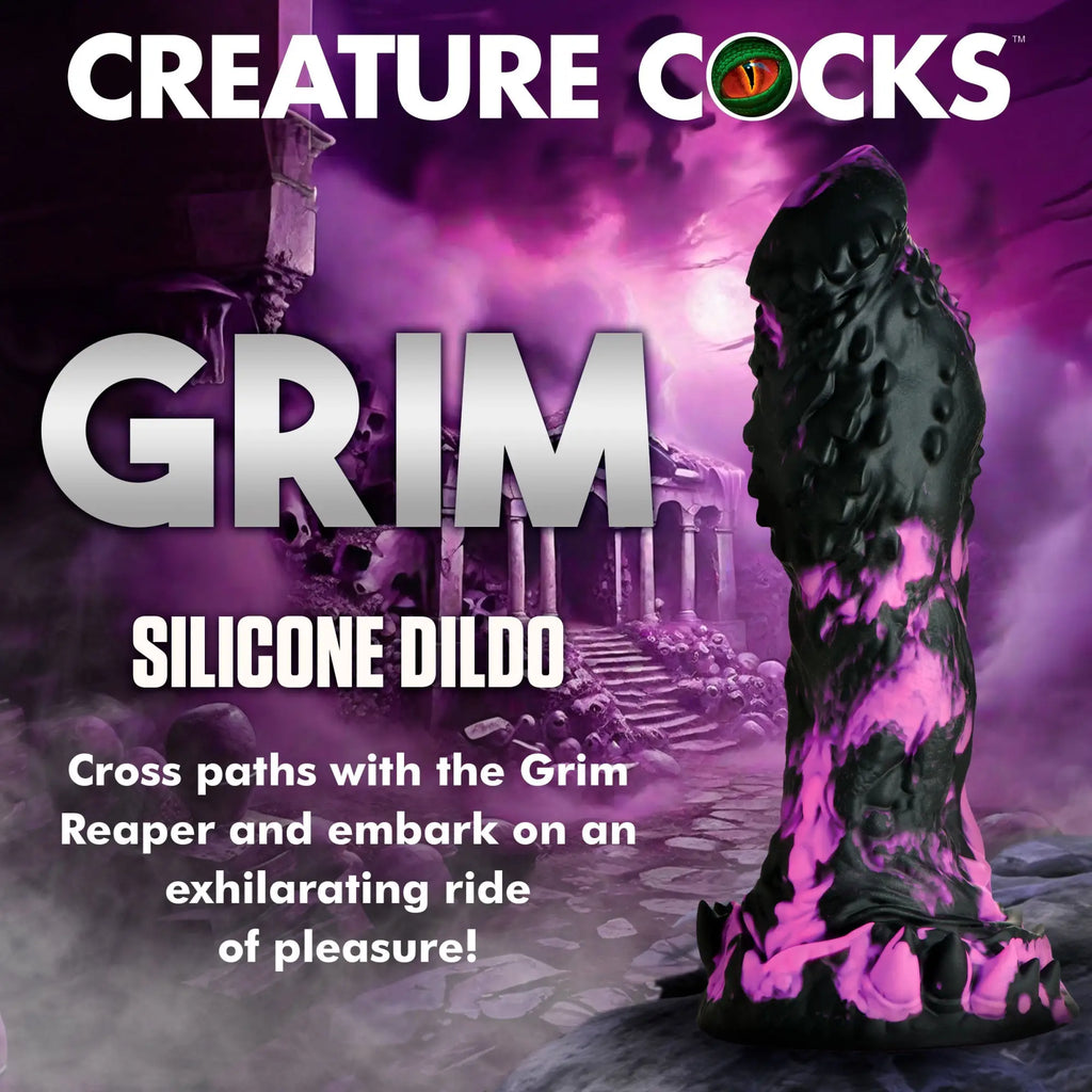 Creature Cocks Grim silicone dildo: a textured black and neon pink fantasy toy against a purple graveyard background.