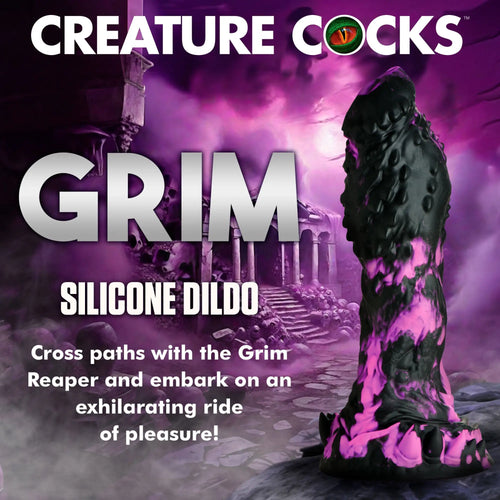 Creature Cocks Grim silicone dildo: a textured black and neon pink fantasy toy against a purple graveyard background.