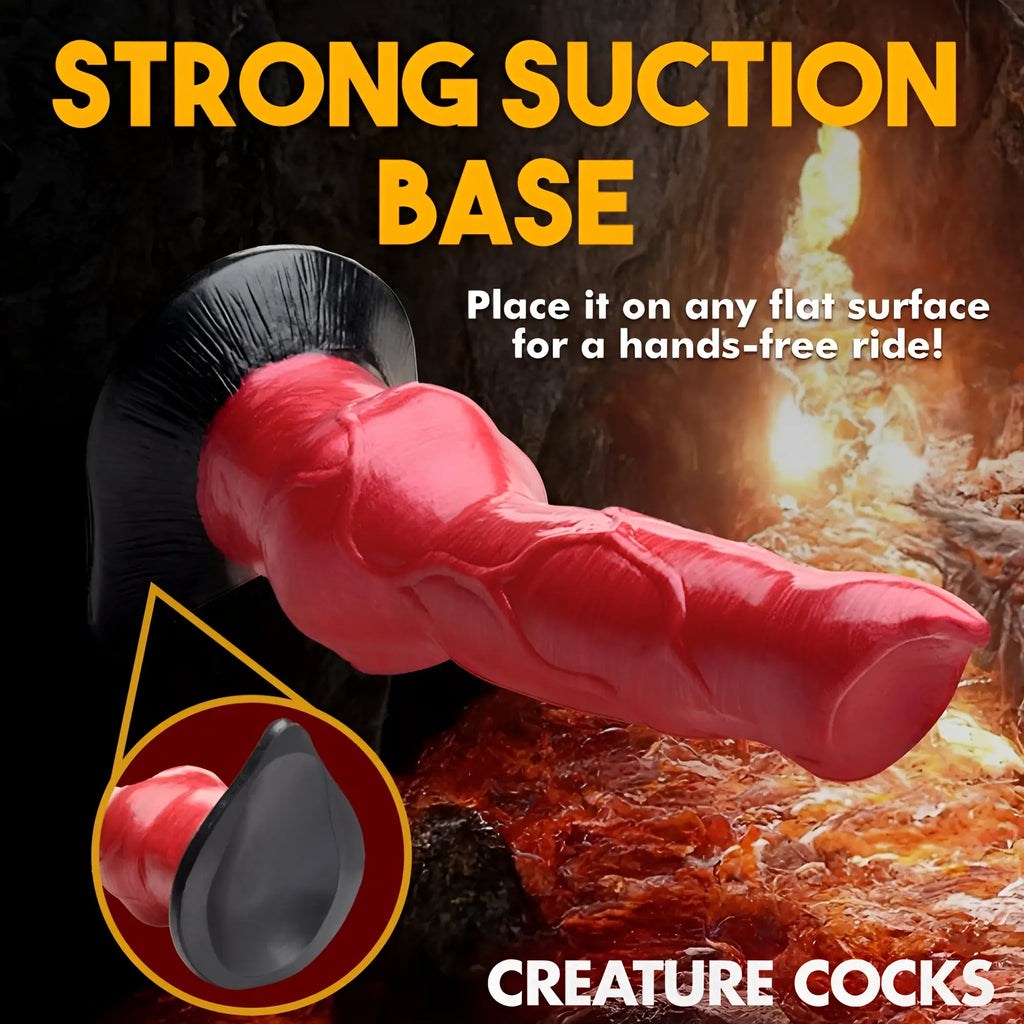 Creature Cocks Hell-Hound dildo: a red, textured silicone fantasy toy with a black suction cup base on a fire background.