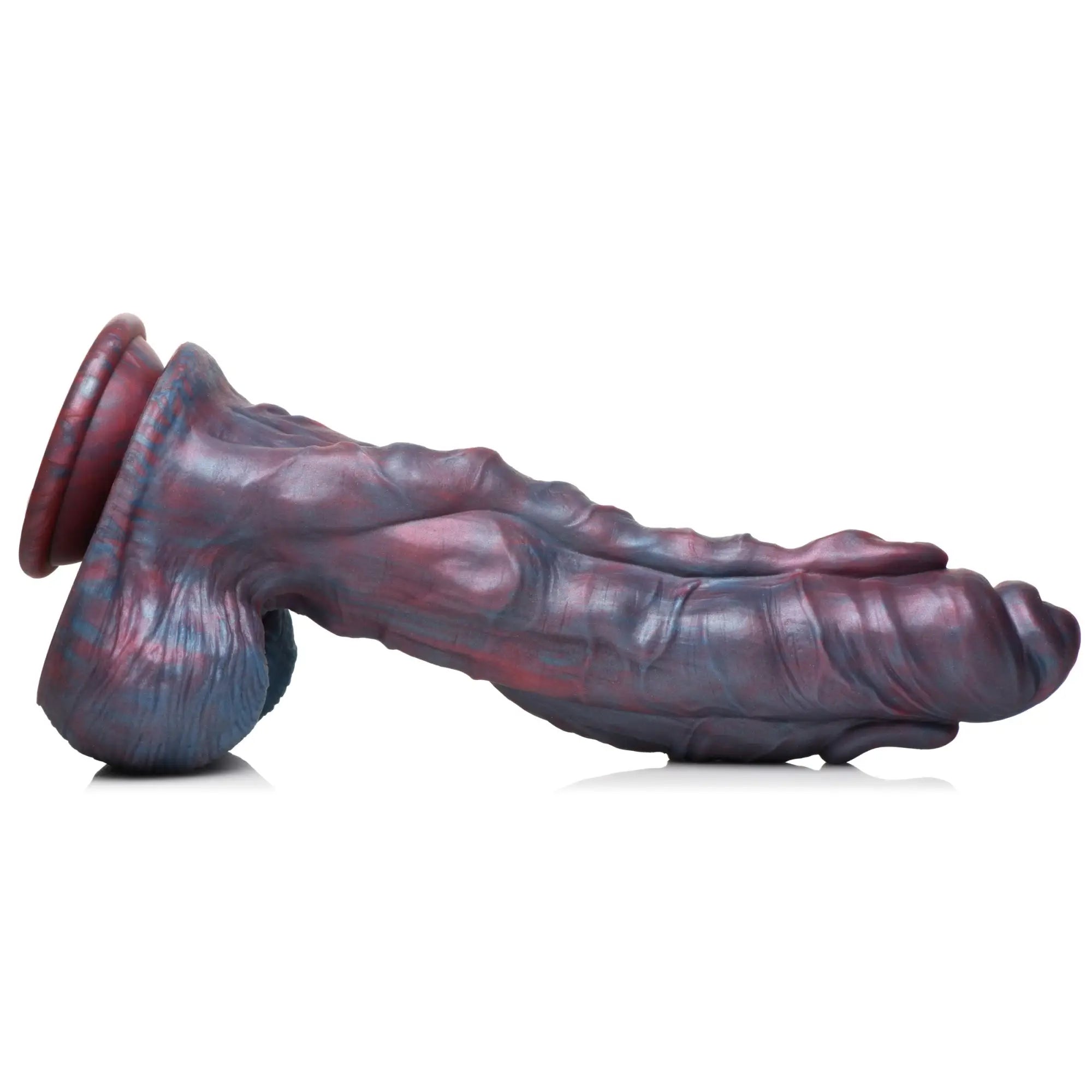 Creature Cocks Hydra silicone dildo in a textured, dark purple and blue marbled design with a suction cup base.