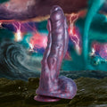 Creature Cocks Hydra dildo in a marbled purple and blue silicone with textured, sea monster-inspired details.