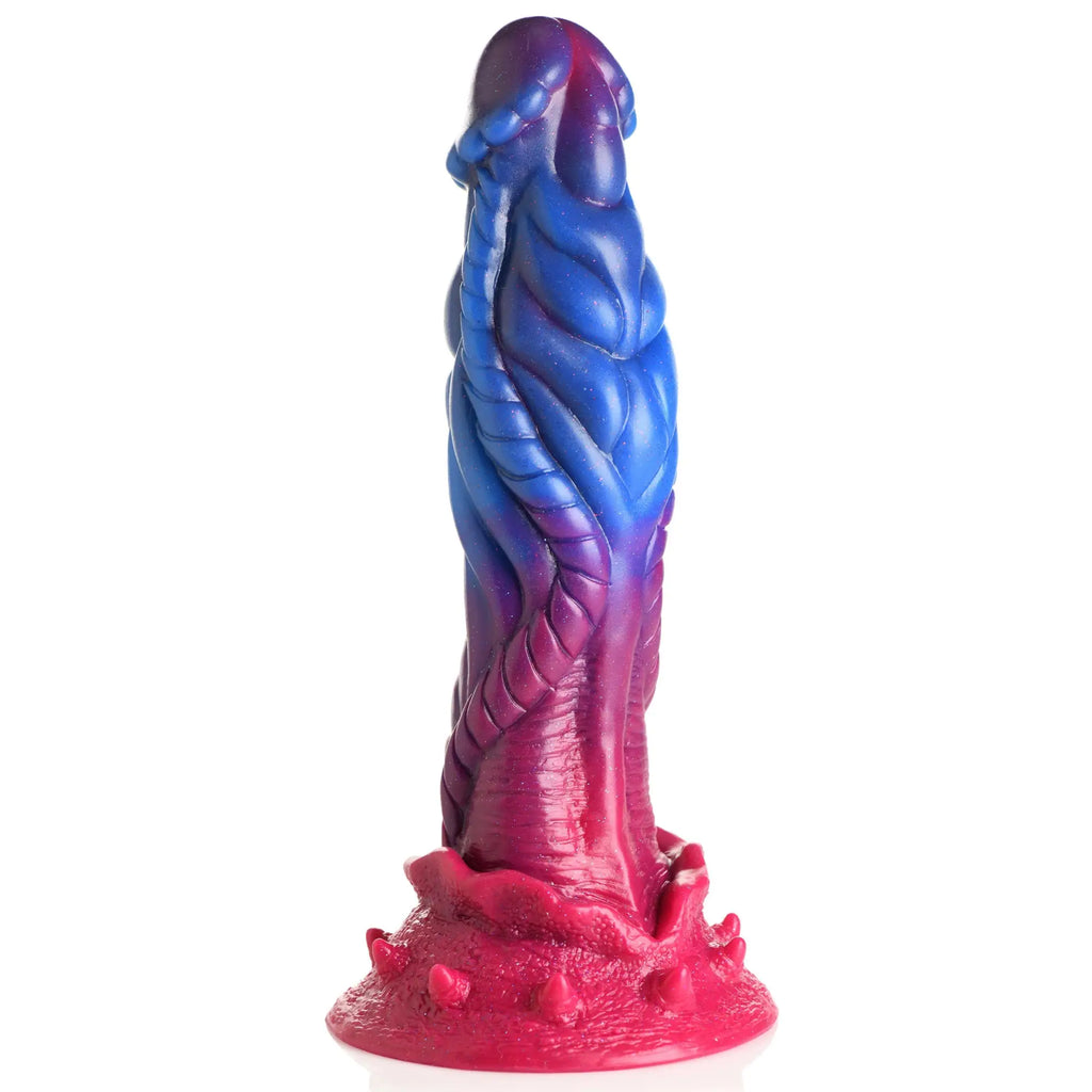 Creature Cocks Intruder silicone dildo in blue-to-pink gradient, featuring alien-inspired ridges and a spiked base.