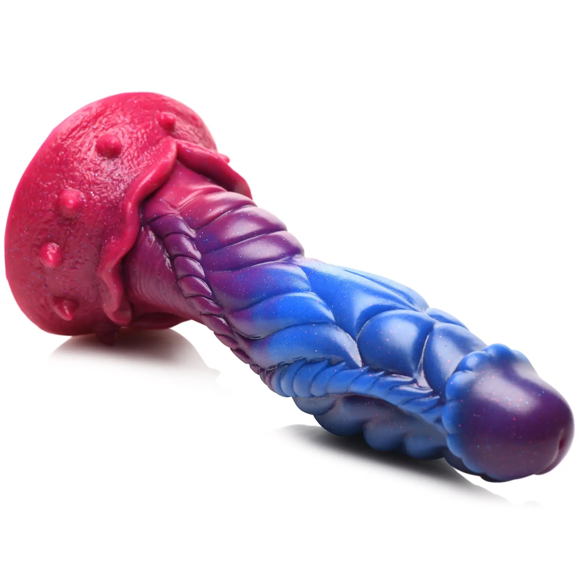 Creature Cocks Intruder silicone dildo in a pink, purple, and blue gradient with textured, alien-inspired details.