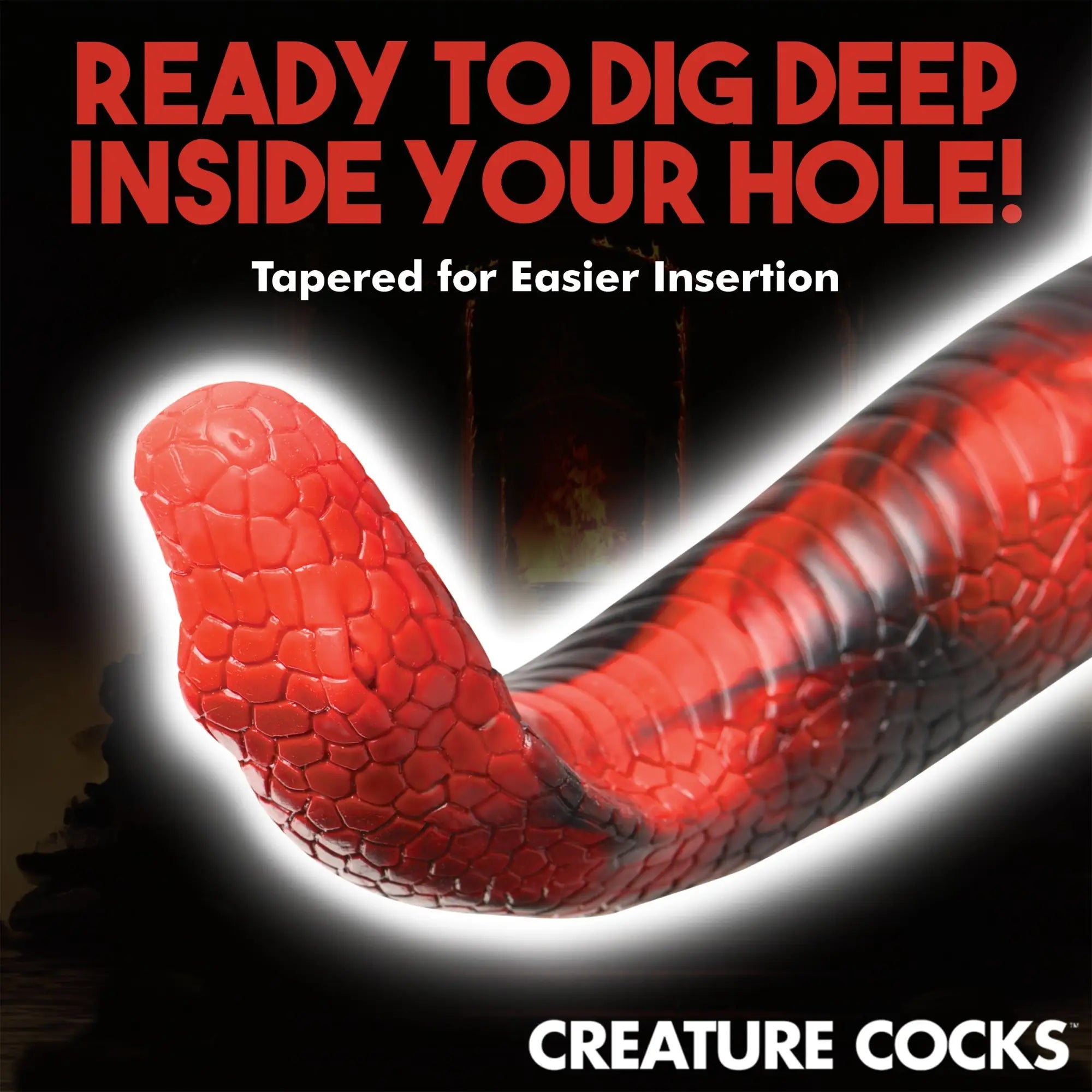 Creature Cocks King Cobra silicone dildo in red and black with realistic snake-scale texture and tapered head.