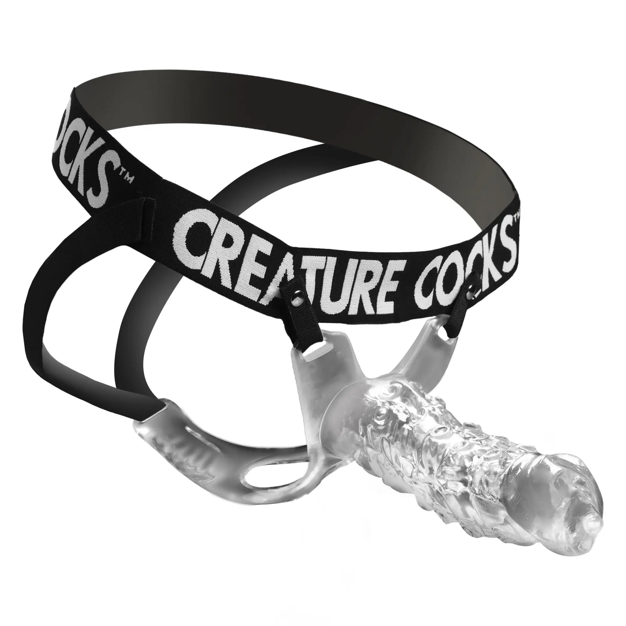 Creature Cocks King Kraken clear textured hollow strap-on with black branded elastic harness on a white background.