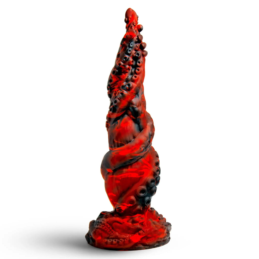 Creature Cocks Kraken Spawn dildo in a translucent red and black swirled silicone tentacle design with suction cups.